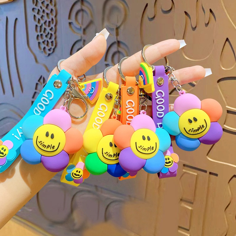 การ์ตูนน่ารักรอยยิ้มสีสันดอกทานตะวัน พวงกุญแจ จี้ผู้หญิงสร้างสรรค์คู่รถเป้ จี้ พวงกุญแจ