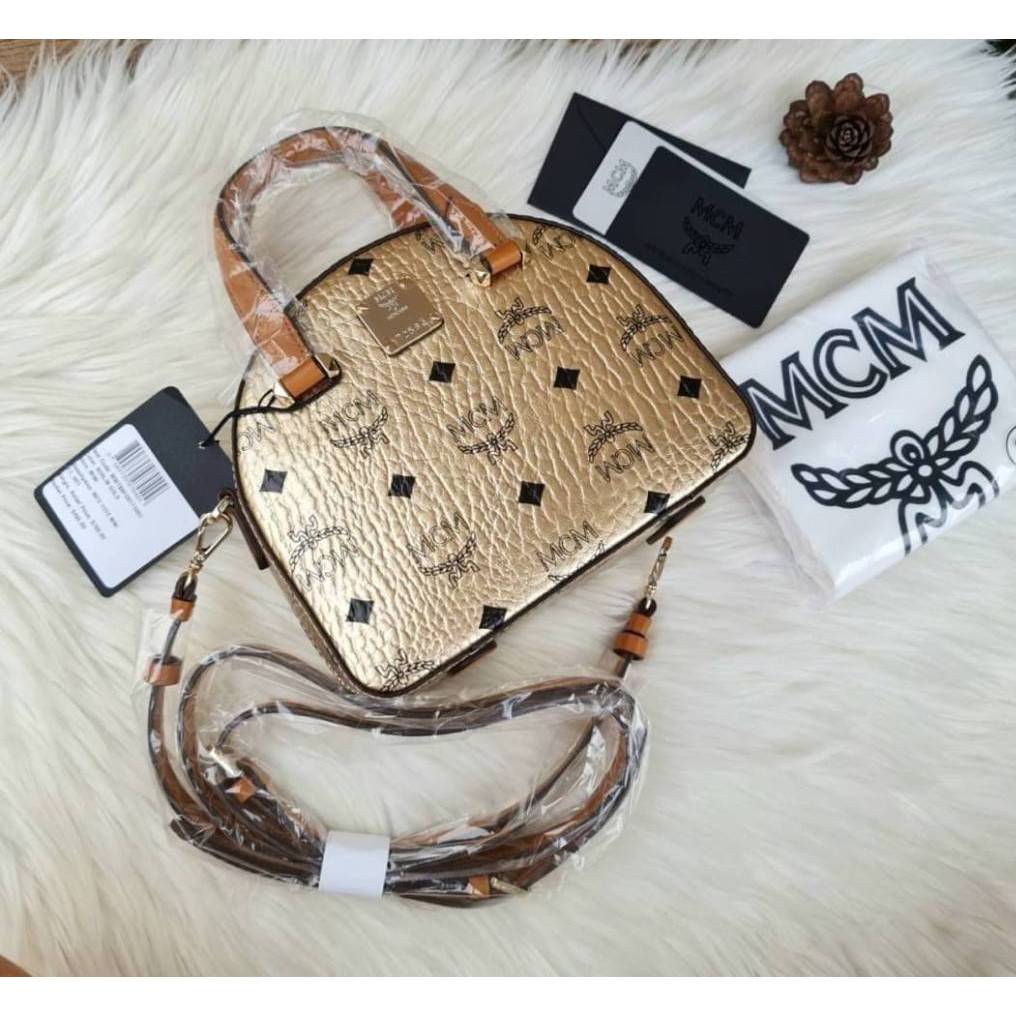 MCM MINI HALFMOON BAG
