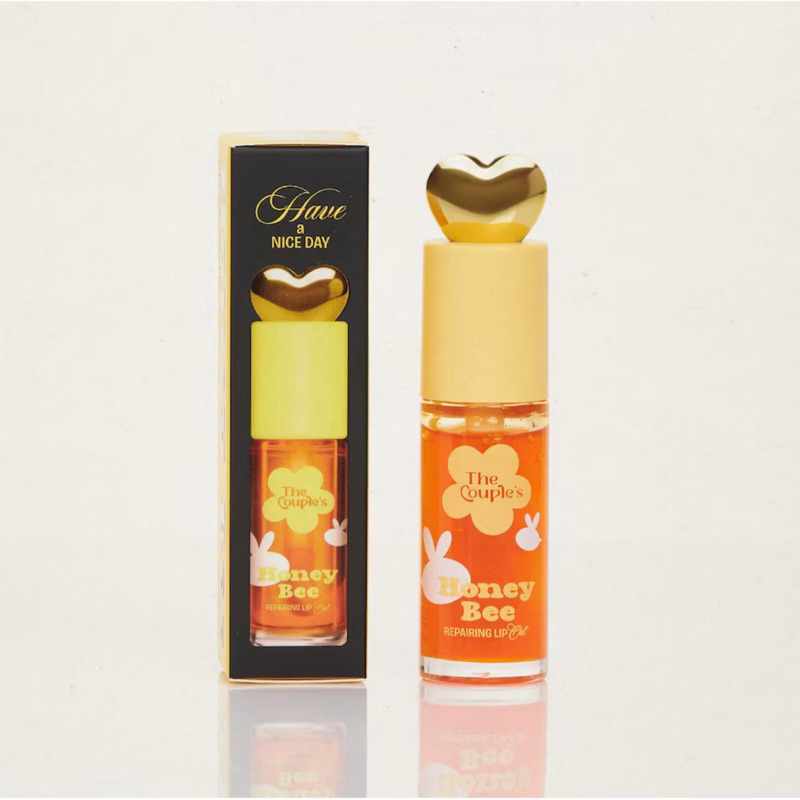 The Couple’s Honey Bee Repairing Lip Oil ลิปออยล์ฮันนี่บีบำรุงริมฝีปากล้ำลึก
