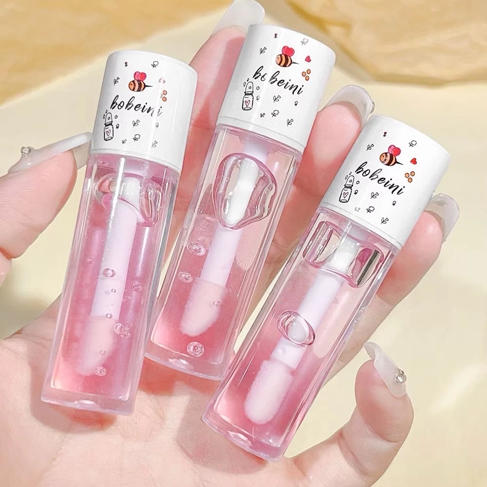 N460 ลิปออยล์ เนื้อลิขวิด แบบใส น้ำผึ้ง พีช ให้ความชุ่มชื้น บำรุงริมฝีปาก