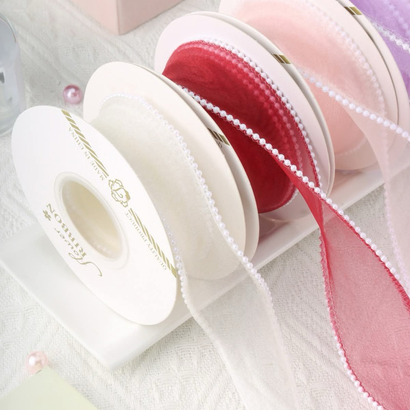 ริบบิ้นผ้าแก้วขอบมุก ขนาด 4 ซม ยาว 3.5 หลา