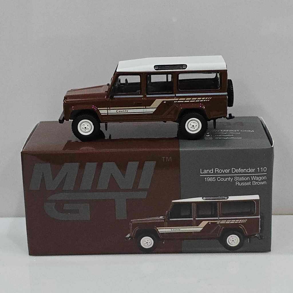 Mini GT 1/64📌No.734📌Land Rover Defender 110 1985 County Station Wagon Russet Brown RHD