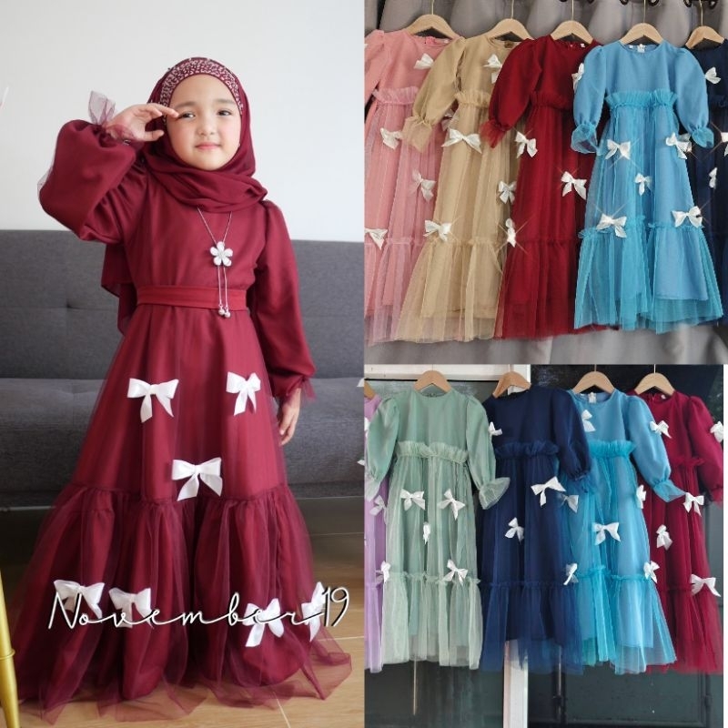 ชุดเดรสมุ้งเด็ก ติดโบว์ น่ารักๆใส่ออกงาน