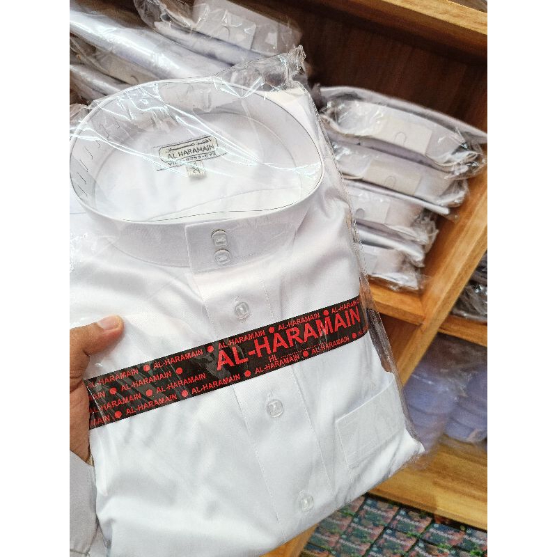 เสื้อโต้ป เเบรนท์ AL HARAMAIN สีขาวมุก เเขนปล่อย