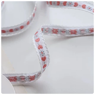 ริบบิ้นปักลายหัวใจ&ดอกไม้ 1.3 cm(1หลา)