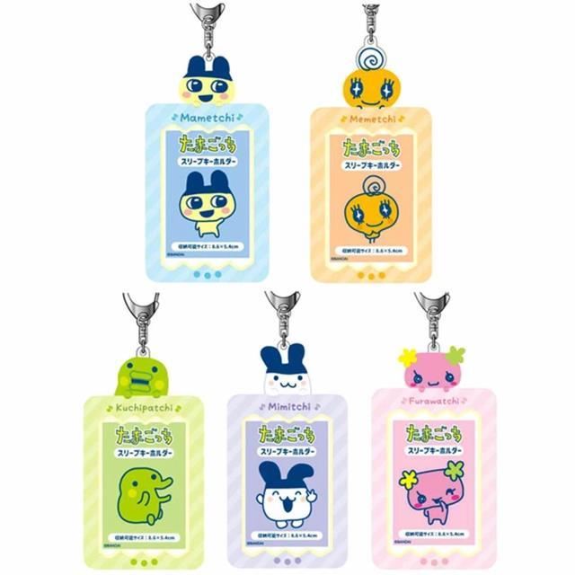 พวงกุญแจใส่รูปได้ frame card keyholder tamagotchi ขนาด: ประมาณ สูง 138 x กว้าง 74 x ลึก 3 มม.