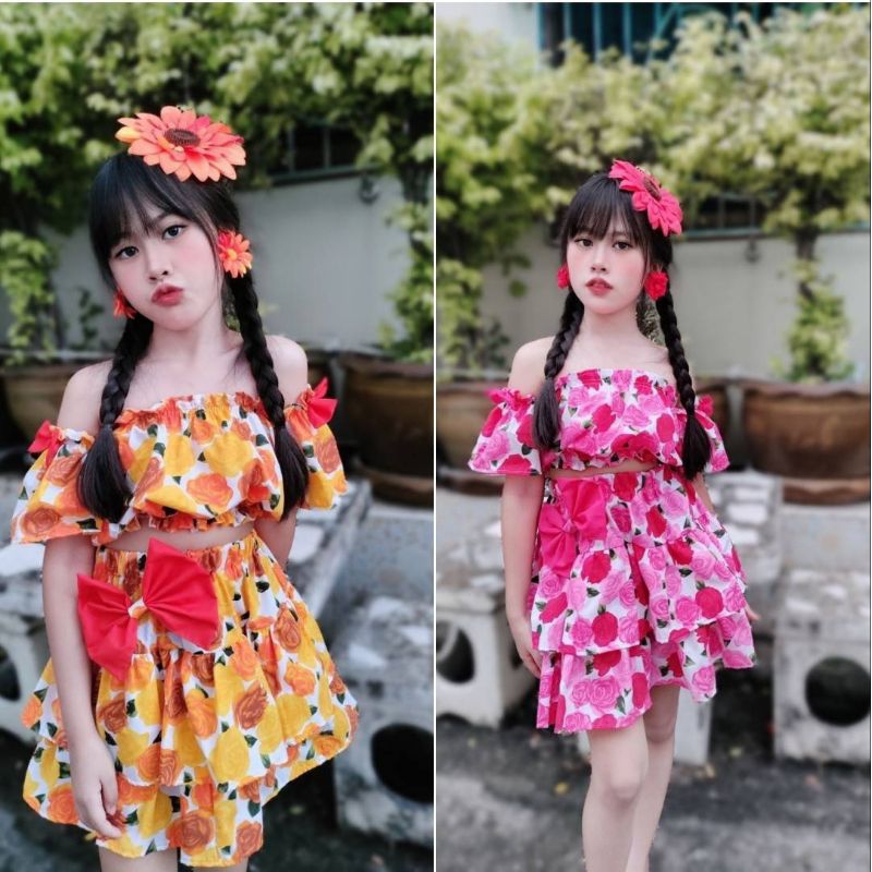 เซ็ต 2 ชิ้น ลายดอกเสื้อปาดไหล่แต่งโบว์ ทองกวาง กระโปรง2ขั้น
