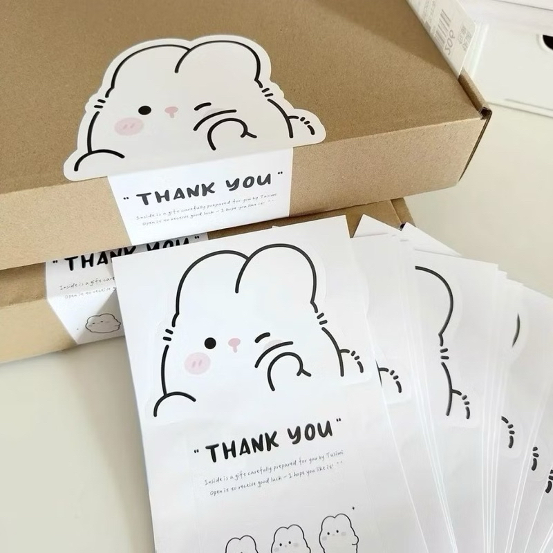 🐰พร้อมส่ง!สติ๊กเกอร์ซีลแผ่นยาว ลายกระต่ายบีบแก้มสีขาว แพค10ชิ้น แปะกล่องพัสดุ