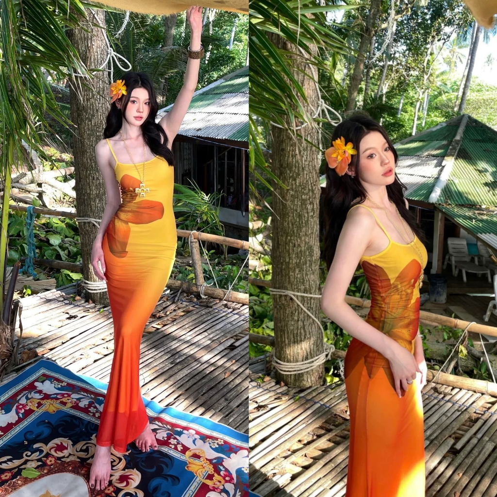 Cicishop(Y6269) เดรสยาวสีเหลืองอมส้ม สายปรับได้ ผ้าซีทรูมีซับใน พิมพ์ลายดอกข้างตัว สไตล์สาวฮาวาย