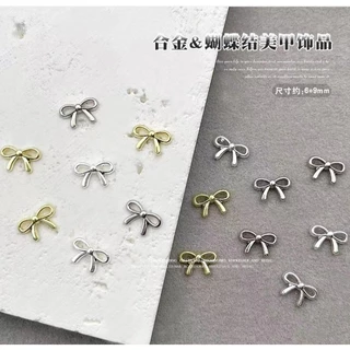 B2.อะไหล่โบว์ตกแต่งเล็บ หนึ่งถุงมี 10 ตัวต่อ ขนาดกลาง สวย ๆ ค่ะ พร้อมส่งจากไทยแลนด์ ปู้นๆ