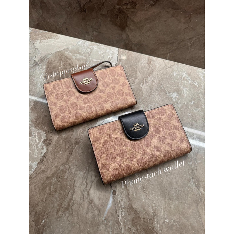 กระเป๋าสตางค์ Phone Wallet In Signature Canvas