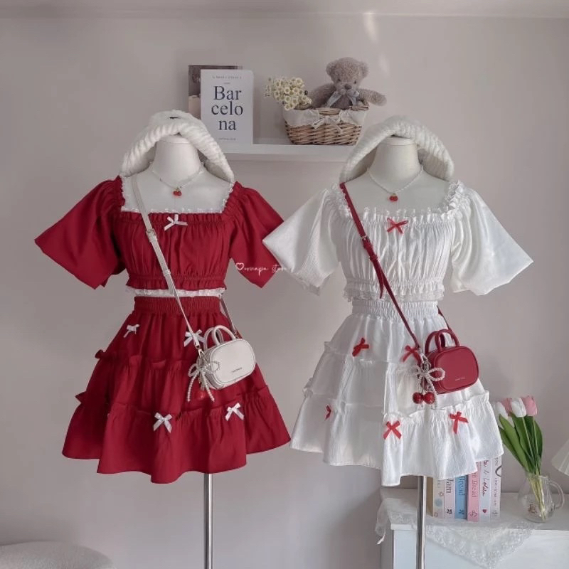 ชุดเซตเสื้อครอปแขนพองบอลลูน+กระโปรงสั้นเอวยางยืด แต่งโบว์