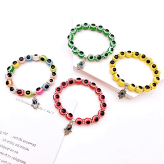 Unicrony • พร้อมส่งกำไลข้อมือดวงตา evil eye lucky ส่งจากไทยมีให้￼เลือกหลายจี้