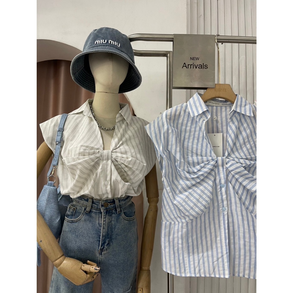 M1681 - ราคา 250 บาท เสื้อแขนกุดลายทางพร้อมโบว์สุดเก๋ ตัวนี้คือความน่ารักที่สาวๆ ห้ามพลาด! เนื้อผ้านุ่ม ใส่สบาย ไม
