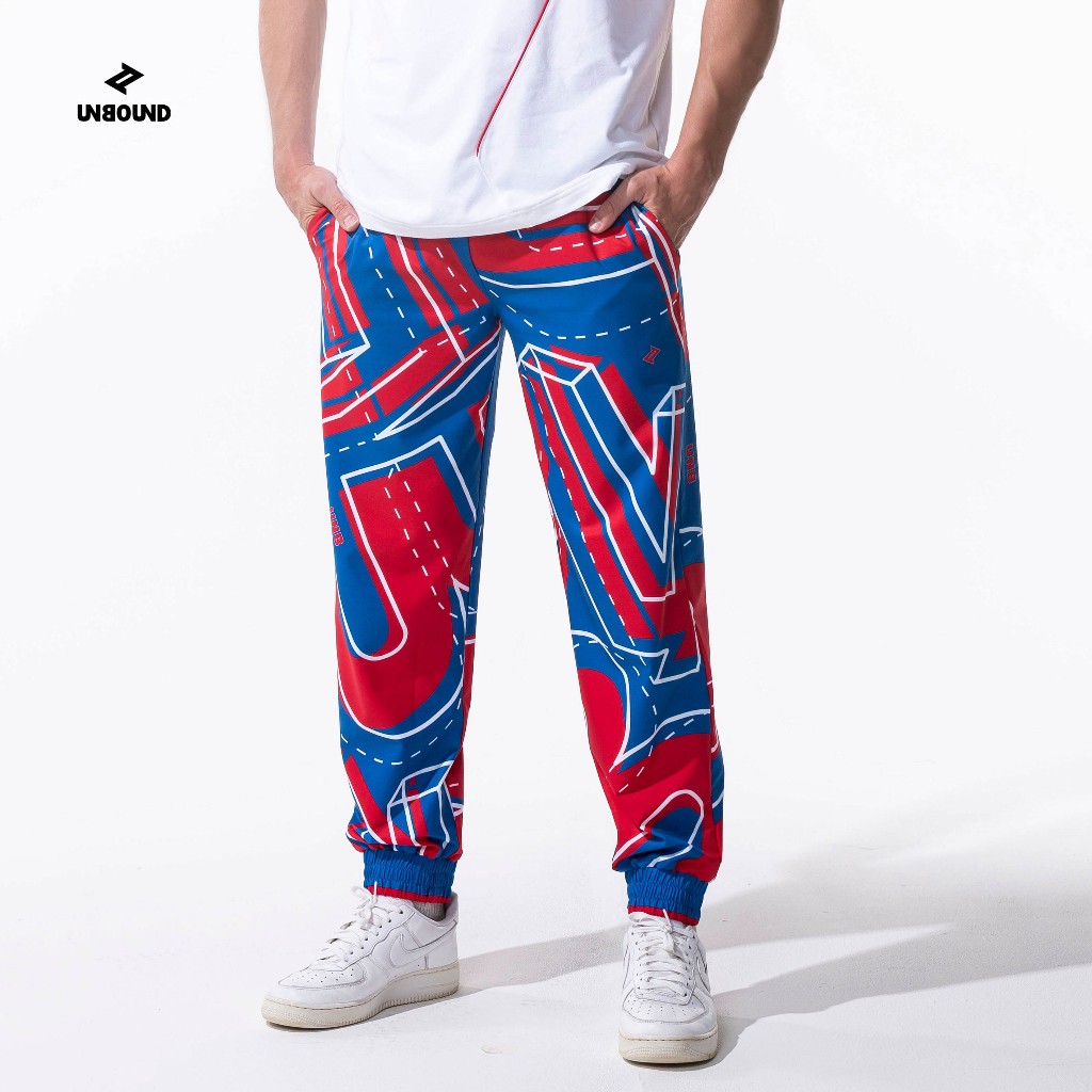 UNBOUND EXPLORED JOGGERS  กางเกงจ๊อกเกอร์ผู้ชาย ทรงหลวม พิมพ์ลายโลโก้