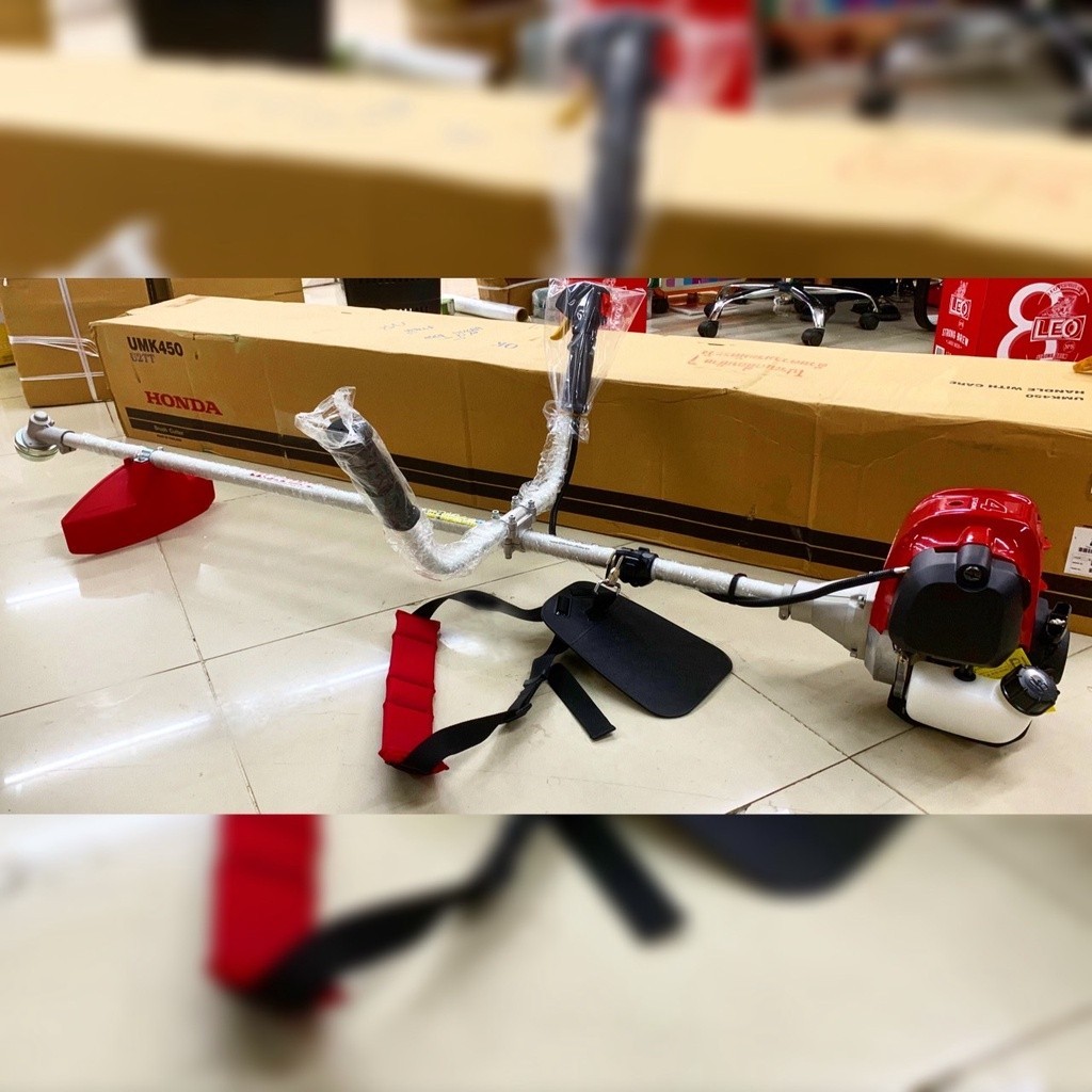 HONDA เครื่องตัดหญ้า รุ่น UMK-450T (ข้อแข็ง) เครื่องยนต์ 4จังหวะ ตัดหญ้าแบบสะพายข้อแข็ง ลานสตาร์ทเบา