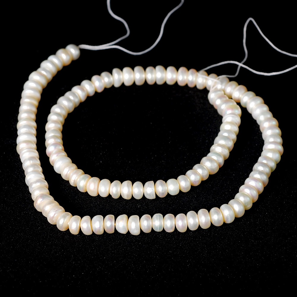 ลูกปัดมุกแท้ลักษณะรูปกลมแบนเจาะรูตรงกลางสีขาว Rondell White Pearl Pearl ขนาด 4x6 mm - (LZ-0716)
