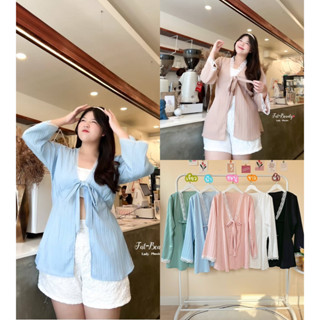 เสื้อแขนยาวผูกโบว์ด้านหน้า ช่วงคอและปลายแขนแต่งลูกไม้หวาน ใส…