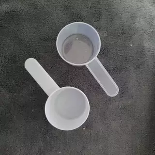ช้อนตวงพลาสติก 35กรัม ใส ก้นแบน ขนาด 70mL.- 35g/70mL Plastic measuring spoon Flat-Bottomed