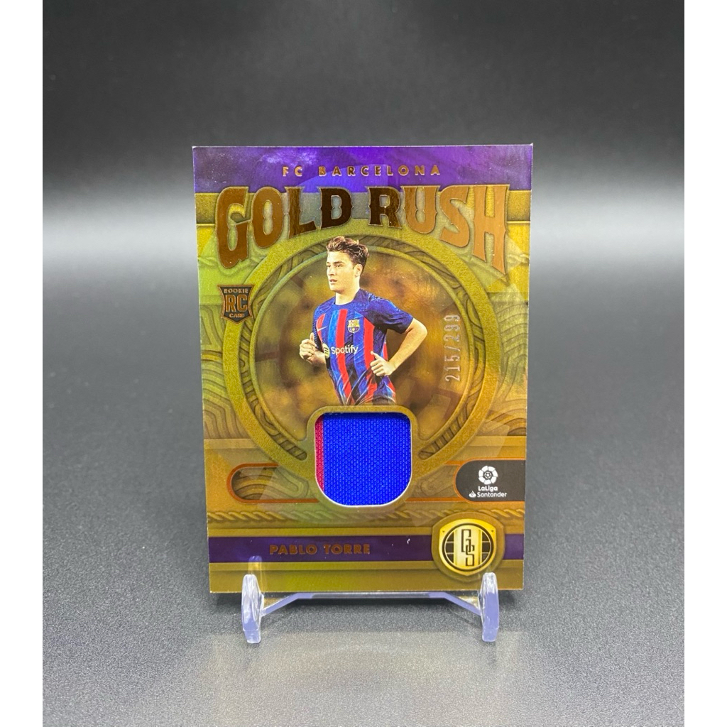 การ์ดฟุตบอล⭐️RC👕ชิ้นส่วนผ้า PABLO TORRE FC BARCELONA GOLD RUSH /299 2022-23 PANINI CHRONICLES GOLD S