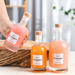 ขวดแก้ว ขวดน้ำผึ้ง ขวดใส่เหล้า หรือ เหล้าบ๊วย ขวดเปล่า ทรงสูง มีจุกล็อก Glass Bottle
