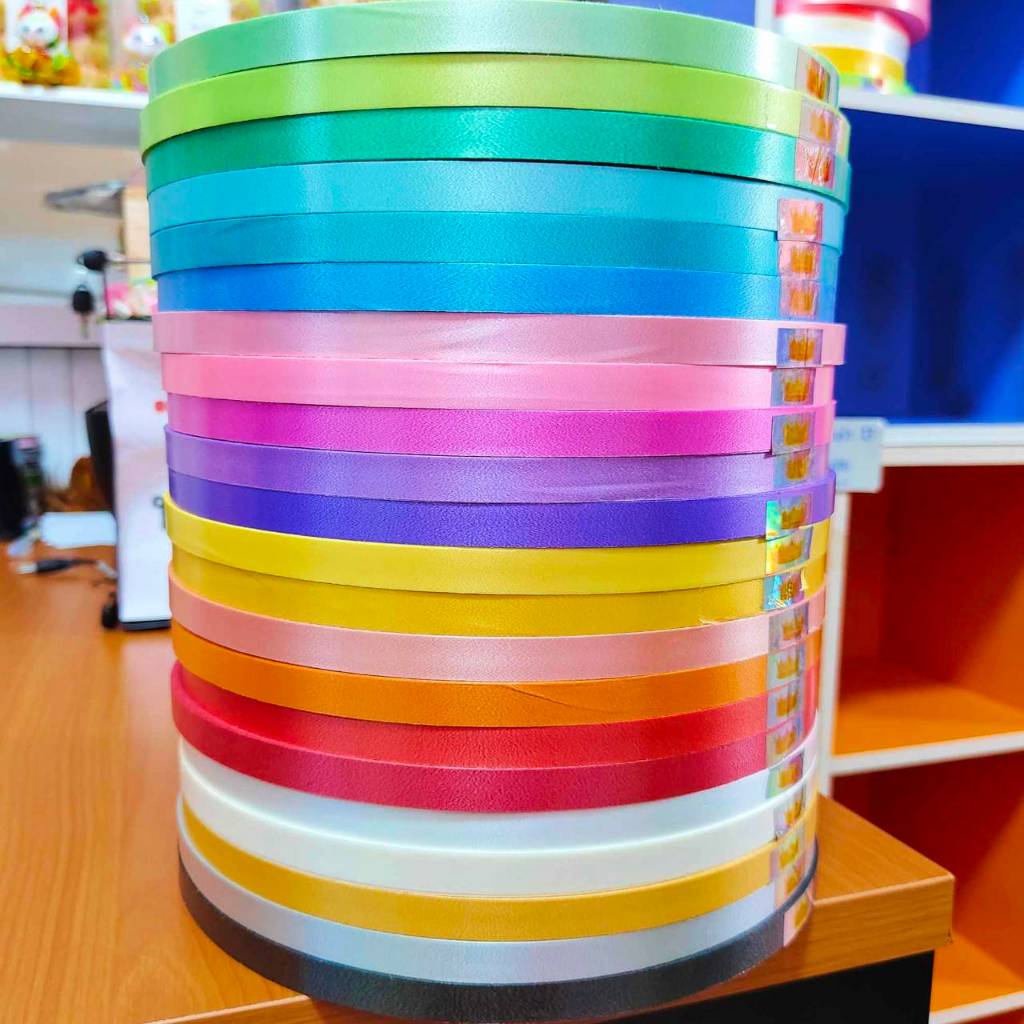 ริบบิ้นพับเหรียญตรามงกุฎ เนื้อทราย ม้วนใหญ่ เบอร์ 2 เนื้อธรรมดา พับเหรียญโปรยทาน พับง่าย ไม่แตก