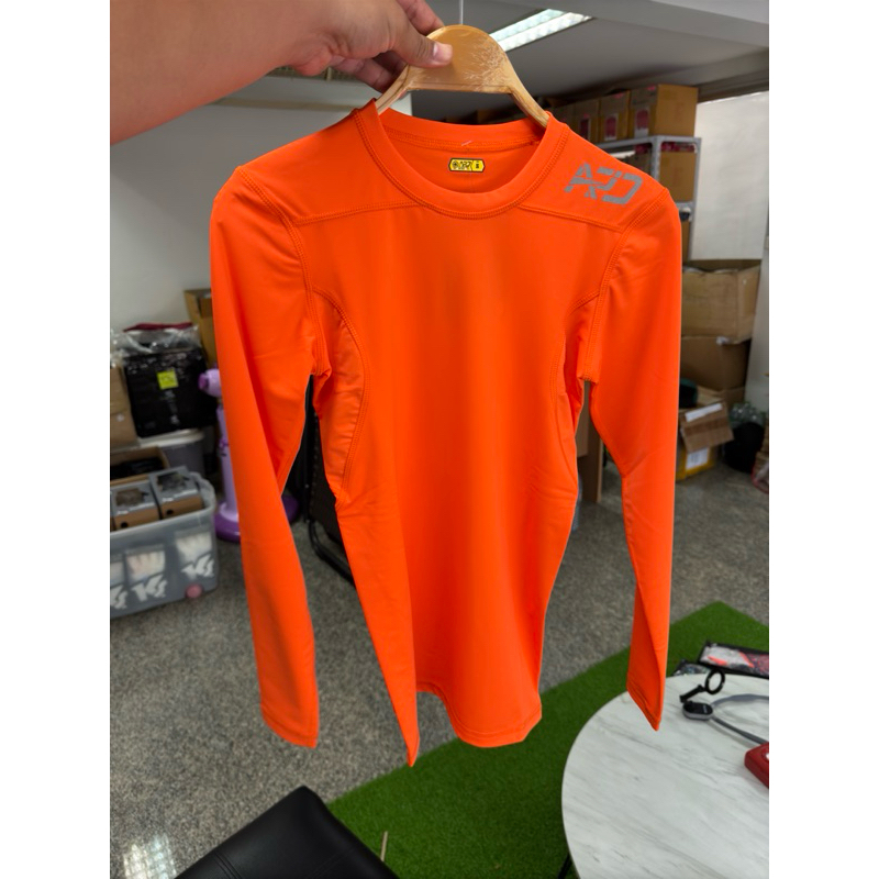 เสื้อรัดกล้ามเนื้อแขนยาวสีส้ม APD Tech-Fit