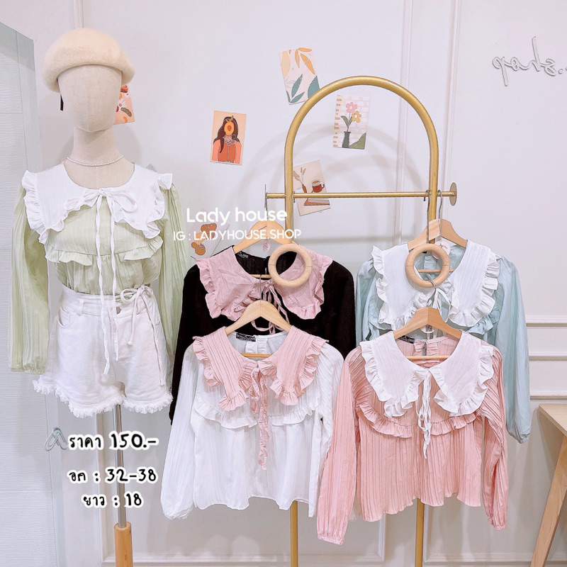 เสื้อแขนยาวแต่งปก มีเชือกให้ผูก ด้านหลังเจาะหยุดน้ำมีกระดุมให้ติด