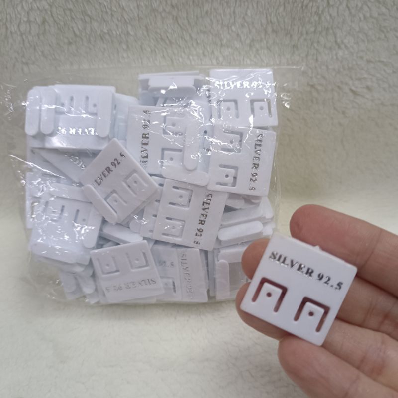 แป้นต่างหู silver แพค 100 ชิ้น พิมพ์ silver 925 มีสีขาวและดำ