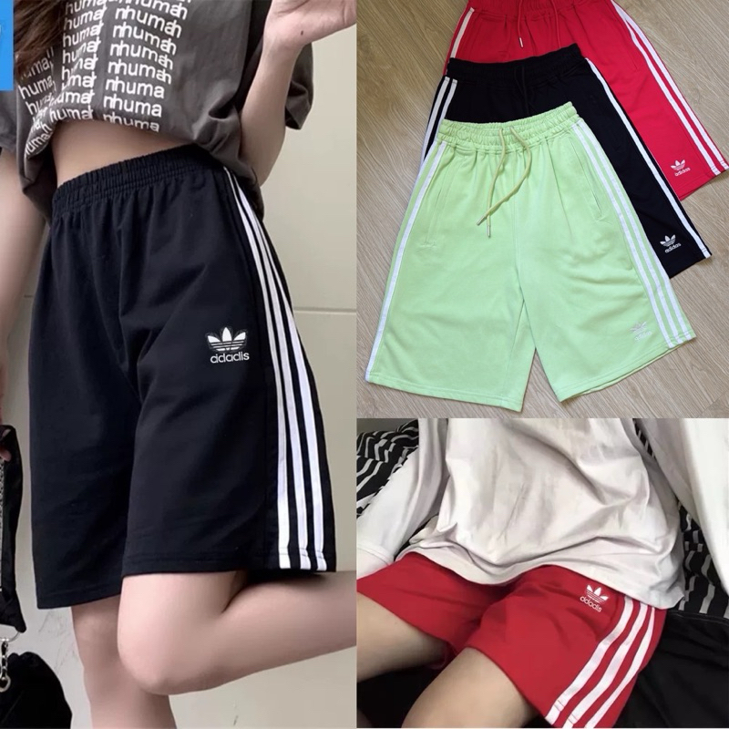 Gang_jeans(Mo)กางเกงขาสั้น คลุมเข่า Adidas adicolour 3-part strip Shorts