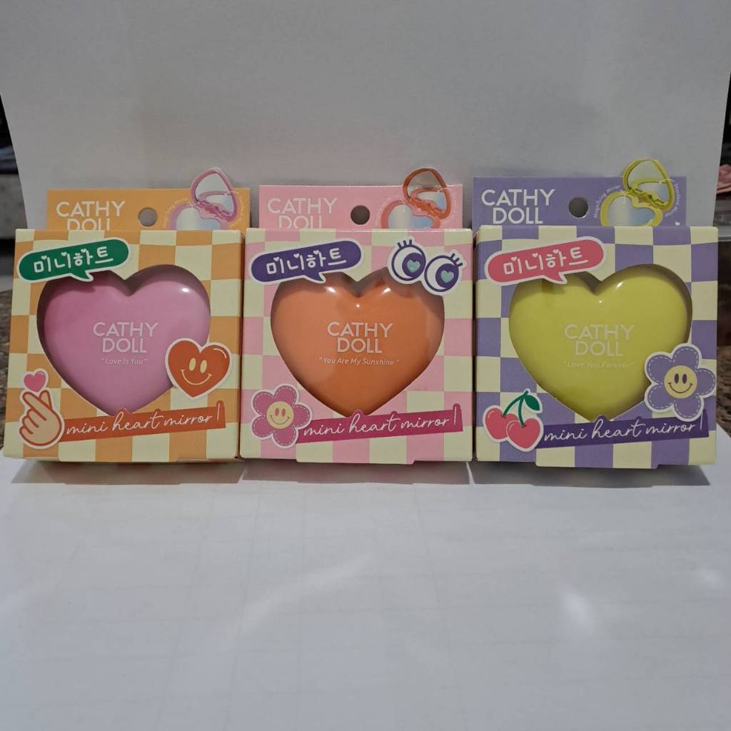 Cathy doll mini heart mirror เคทีดอลกระจกพับรูปหัวใจขนาดพกพา มี 3 สี ให้เลือก