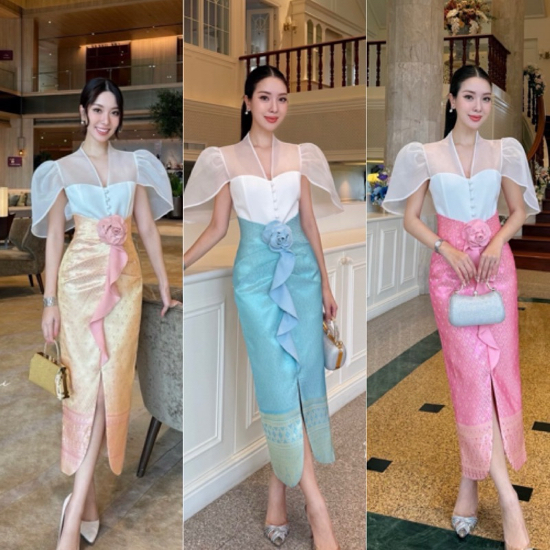 ชุดไทยใส่ทำบุญรับปีใหม่สุดปังเซตนี้เลยค่ะเซตผ้าไทยเสื้อซีทรูสีขาวปีกกว้างมาคู่กับผ้าถุงผ่าหนัาเข็มกลัดดอกไม้