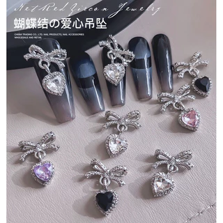 โบว์ห้อยเพชรหัวใจ สำหรับแต่งเล็บ งานอลังเพชรตุ้งติ้ง 10 ชิ้นต่อแพ็ค