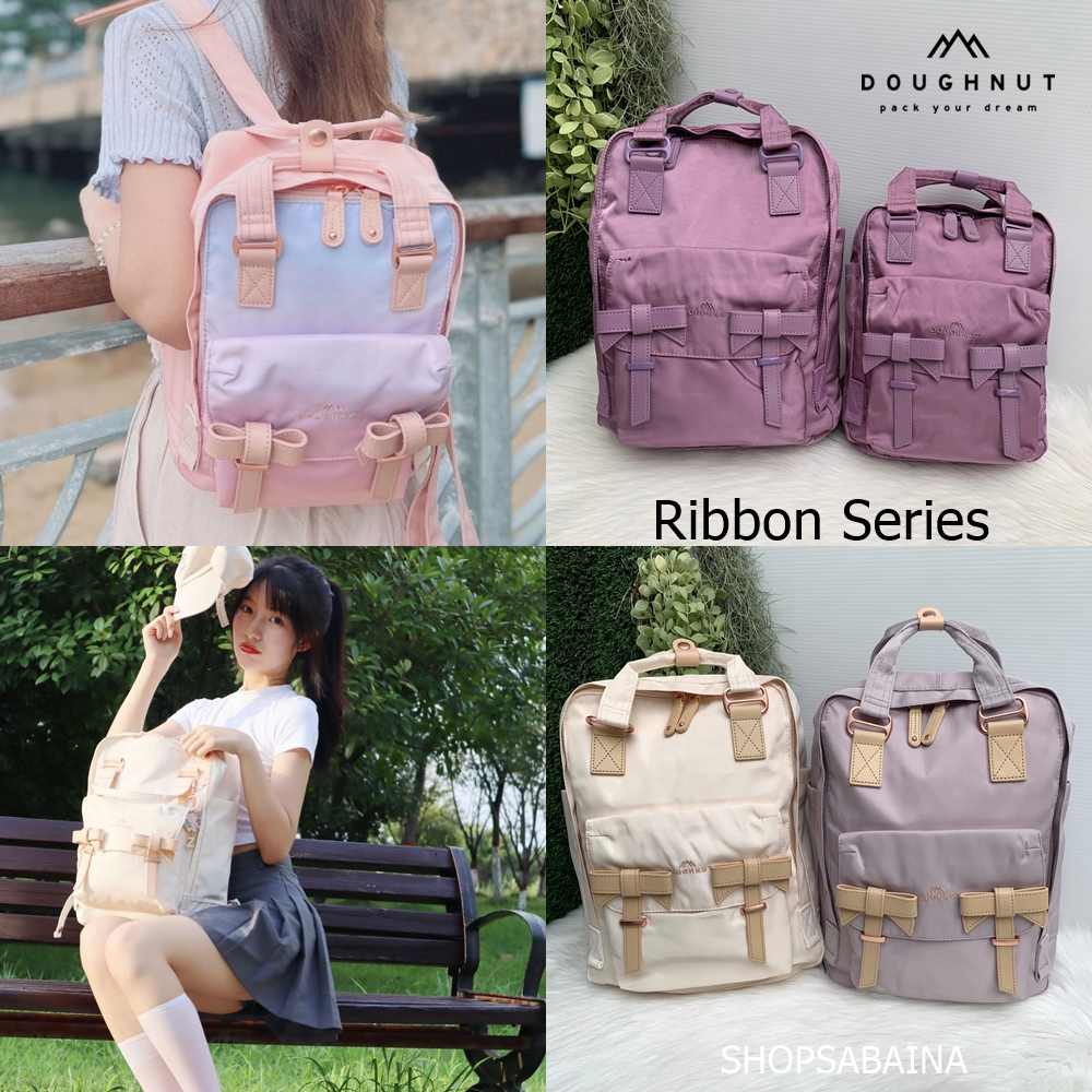 Doughnut Macaroon Ribbon Backpack กระเป๋าโดนัท หน้าโบว์ กันน้ำ (แถมตุ๊กตา)