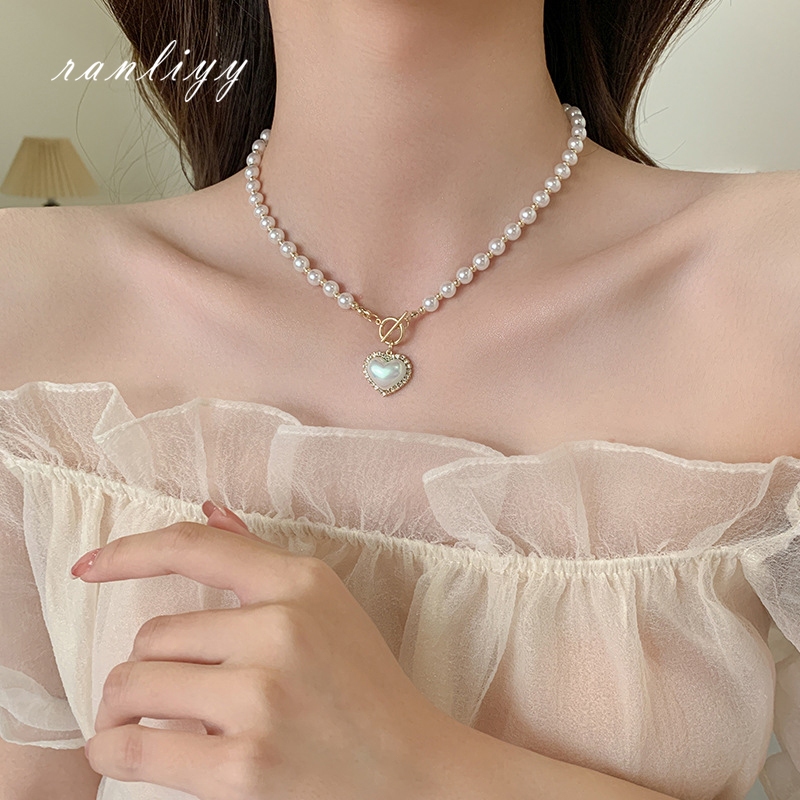 ส่งเร็ว🌼สร้อยคอลูกปัดมุกจี้หัวใจหรูหราสไตล์เกาหลีแฟชั่นโซ่ไหปลาร้าระดับไฮเอนด์เครื่องประดับสำหรับผู้หญิงของขวัญ-Ranliyy