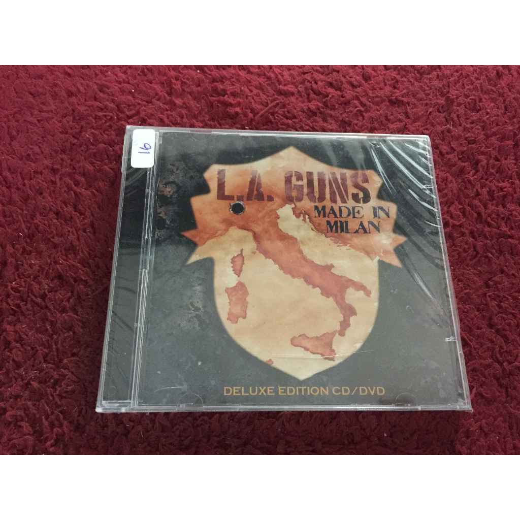 CDเพลง L.A. Guns – Made In Milan สภาพตามรูปปกMaizui