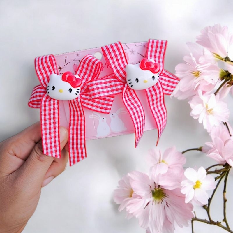 กิ๊บคิตตี้ลายสก็อตน่ารักๆ ราคา/แผง(2ชิ้น)