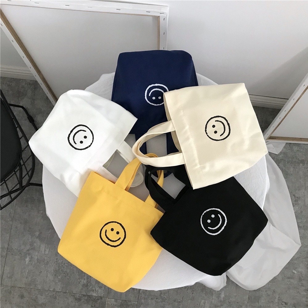 【พร้อมส่ง】bag fashion กระเป๋าถือ แฟชั่นมาใหม่ รุ่น กระเป๋าถือหน้ายิ้ม