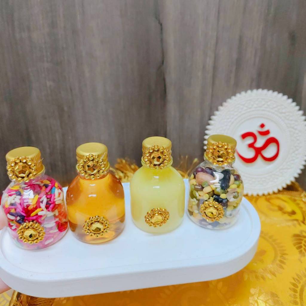 ชุดไหว้ 4 ขวดจิ๋ว พระพิฆเนศ ข้าว ถั่ว 9 สี น้ำผึ้ง เนยกีย์ ถวายขอพร พระพิฆเนศ