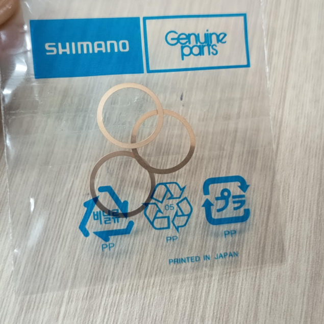 ซิม 1ชุด 3 แผ่น  รองลูกปืน ฝาข้าง SHIMANO 22 STELLA  รองลูกปืนเบอร์ 12 ด้านฝาข้างฝั่งซ้าย(1022D)