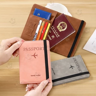 ที่ใส่หนังสือเดินทาง RFID ป้องกันแม่เหล็ก วัสดุ PU แปรงกันน้ำ ป้องกันคราบ ที่ใส่บัตรหลายใบ สำหรับการเดินทางระหว่างประเทศ