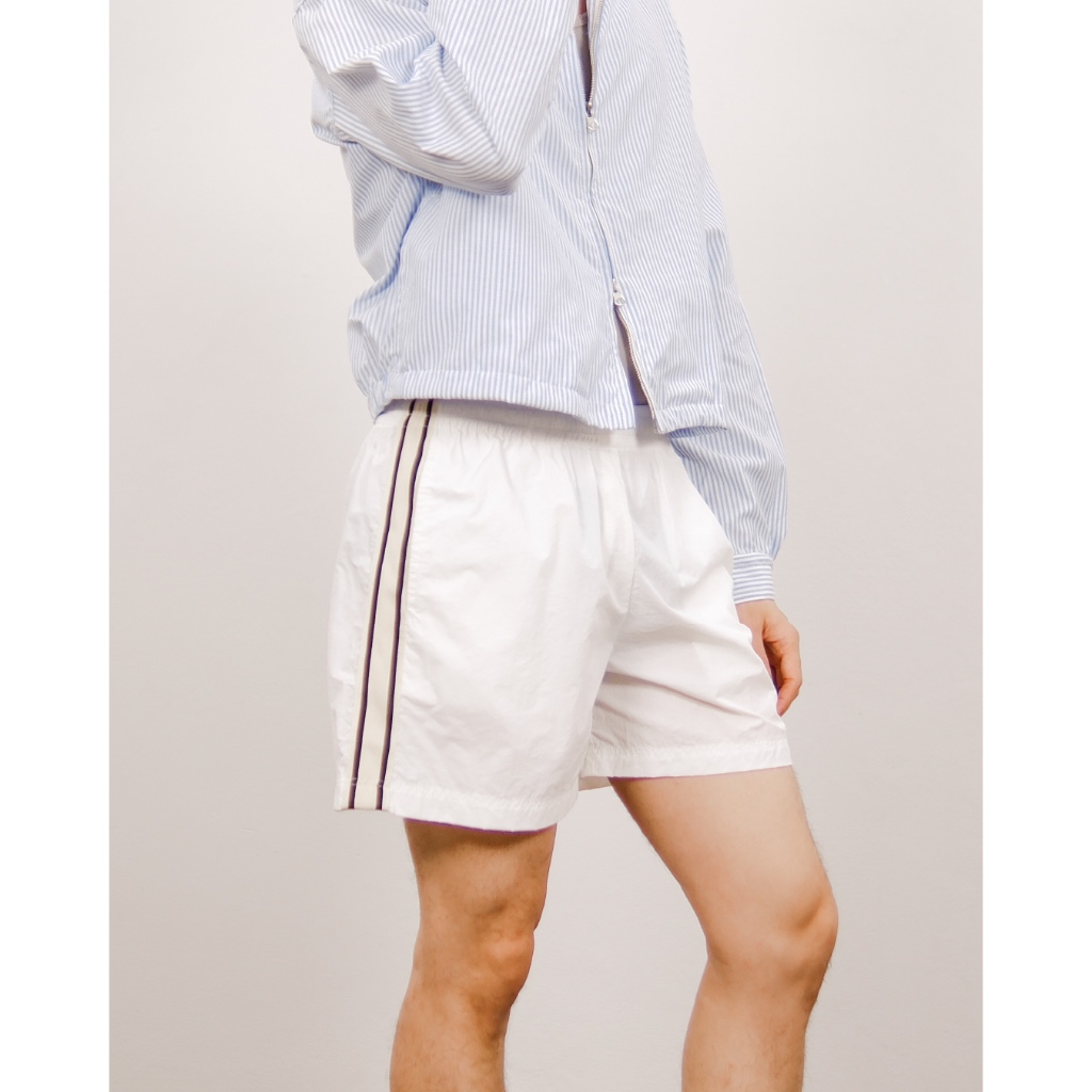 Nylon Track Shorts in Pure White | กางเกงขาสั้น สไตล์สปอร์ต แต่งเทปข้าง ผ้าไนล่อน สีขาว