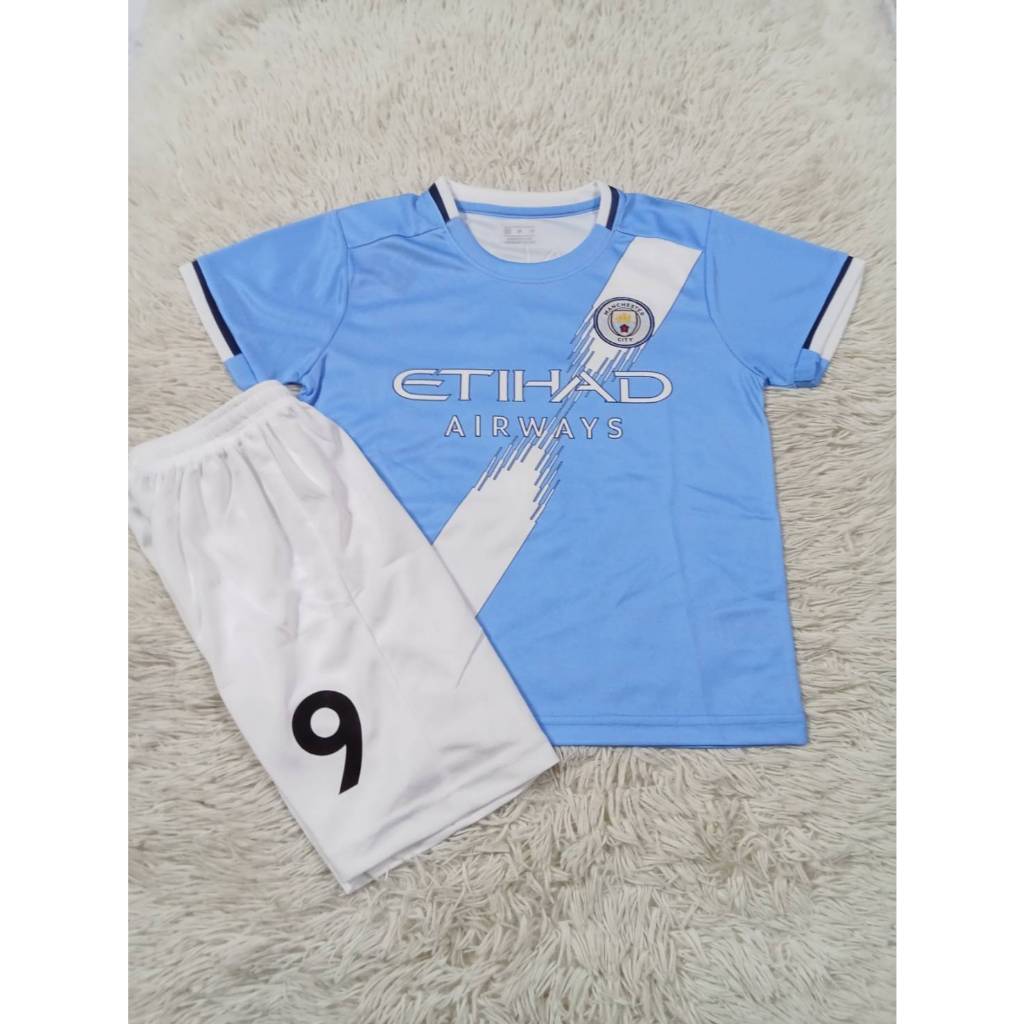 เสื้อบอลเด็กทีมเเมนเชสเตอร์ซิตี้NO9ชื่อฮาเเลนด์ ใหม่ล่าสุดปี2025-2026 เสื้อ+กางเกง