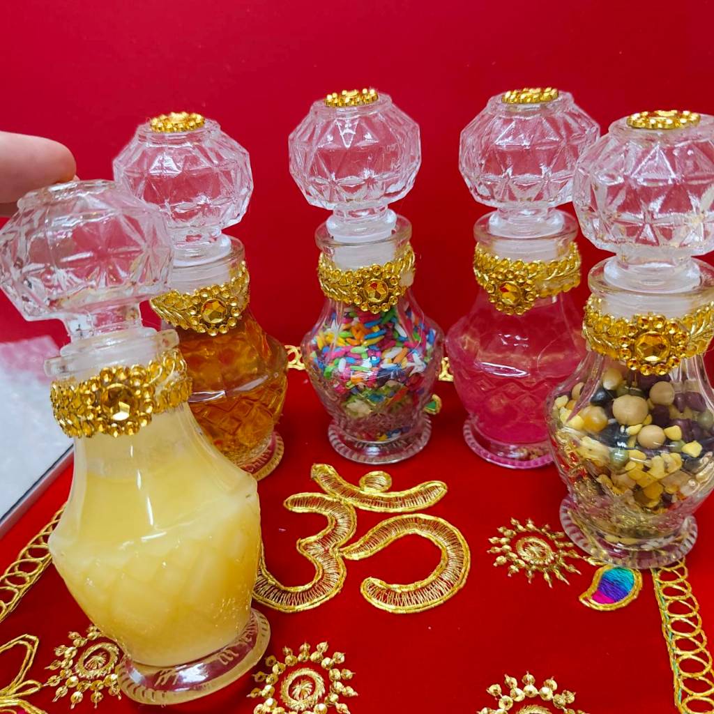 ชุดไหว้ขวดคริสตัส ทรงสูง เนยกีย์ น้ำผึ้ง ถั่ว 9 สี ข้าว 9 สี น้ำกุหลาบ กริสเตอร์ ขนาด 50 ml