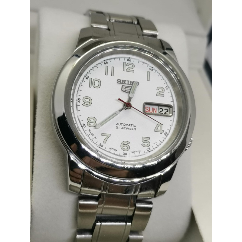 นาฬิกา Seiko 5​ ​ Automatic​ กลไกลระบบเครื่อง 7s26 หน้าขาวตัวเลขพรายน้ำ หลักตัวเลข