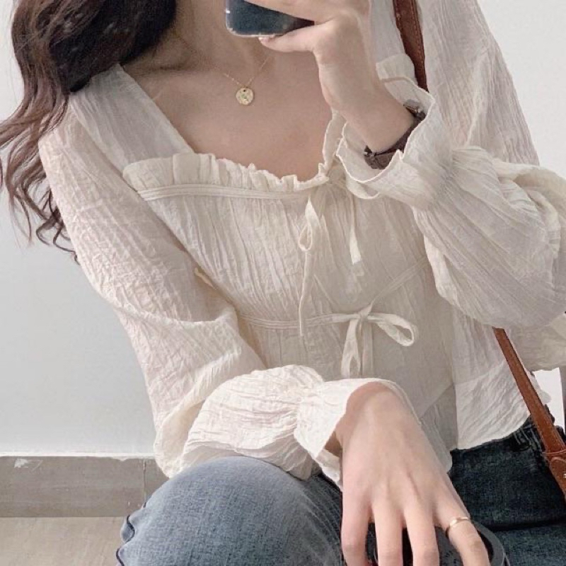 nomade.___ ‘new plait top’