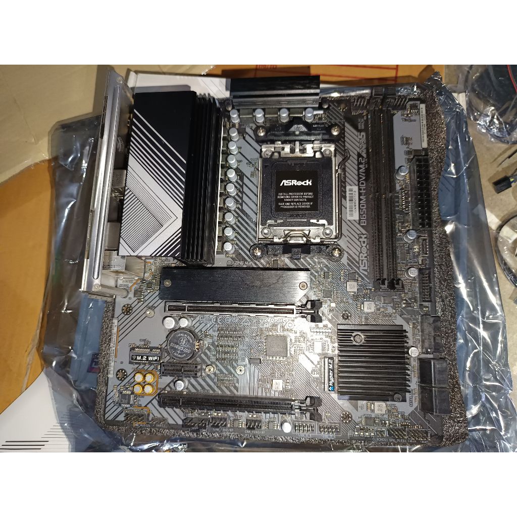 **ส่งฟรี** MAINBOARD AM5 ASROCK B650M-HDV/M.2 DDR5 สภาพสวยประกัน synnex + Plate CPU ประกันใจ 7 วัน