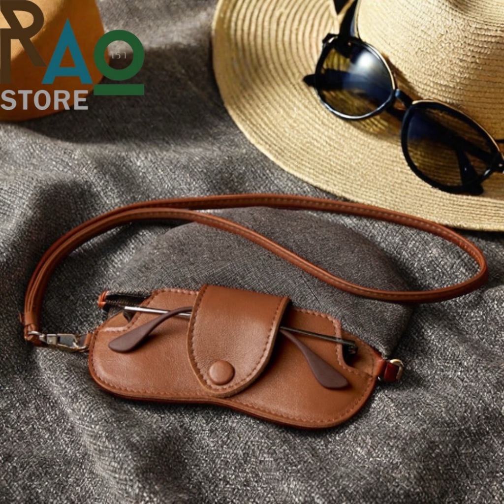 Rao Store พร้อมส่ง ซองใส่แว่นตาหนังPU มีสายสะพาย วัสดุเป็นหนังนุ่มนิ่ม ปิดด้วยกระดุมแป๊ก มีสายคล้องคอ ใช้งานสะดวก