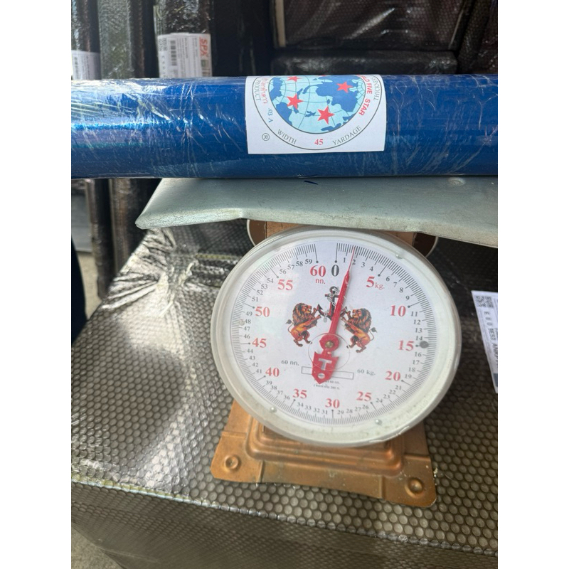 ม้วนพลาสติกPVC พลาสติกห่อของ กว้าง 54" หนา 0.03 มม. ยาว 25 หลา ตราช้าง , ยาว 45 และ 60 หลา ตราลูกโลก