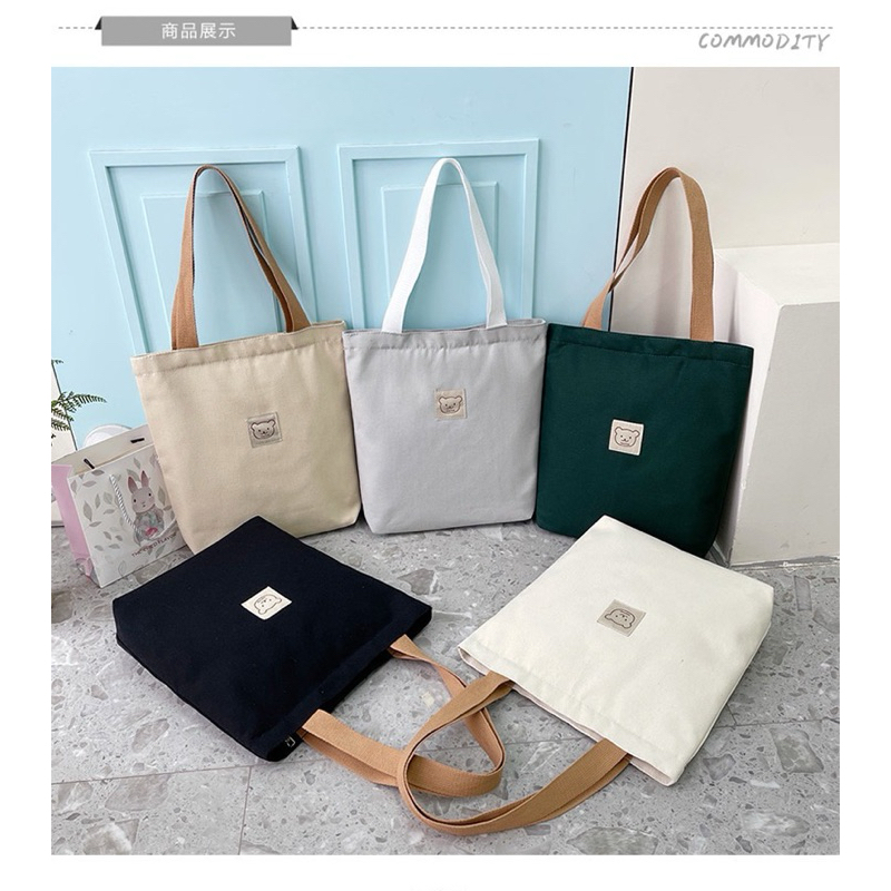 มี 2 แบบ แบบถือและสะพายไหล่ กระเป๋าผ้าโลโก้หน้าน้องหมีน่ารัก 🐻มีซิป ผ้าแคนวาส น้ำหนักเบา👍🏻 - รูปที่ 5